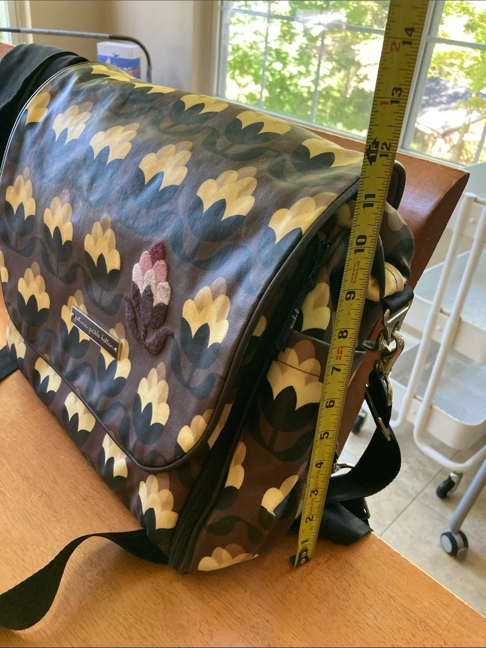 Petunia Pickle Bottom Brown Floral Messenger Diaper Bag with Yellow Tulip Motif